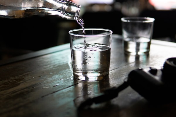 Clean filtered water being poured into a glass